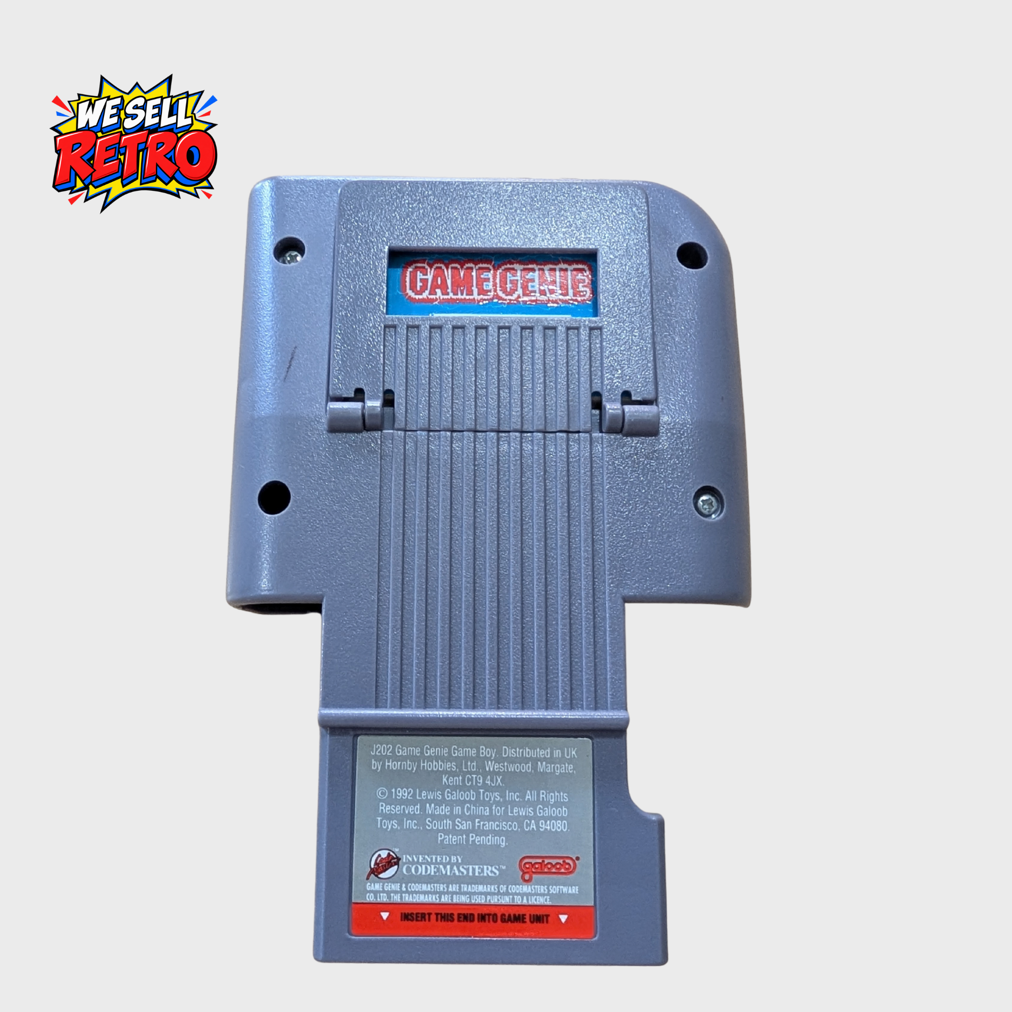 Galoob Game Genie for Nintendo Game Boy – With Programming Manual and Codebook Game Boy Game Genie rear with codebook in storage compartment