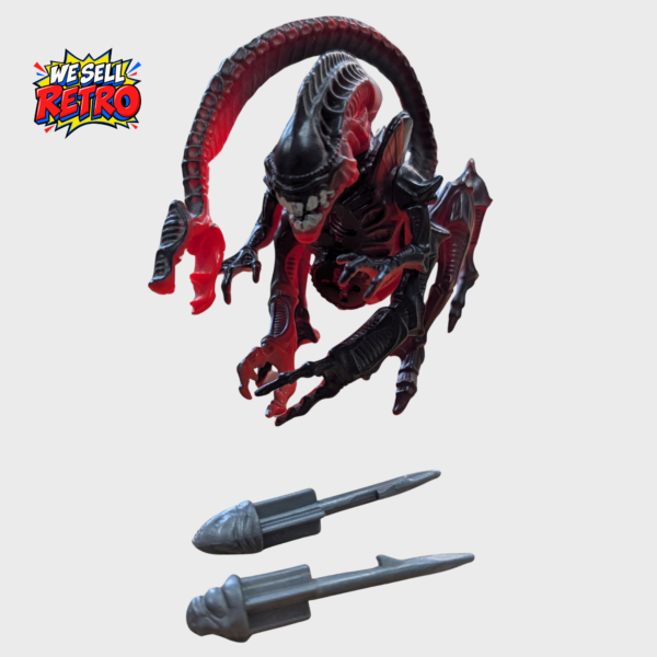 Kenner Aliens Killer Crab Alien figure with both grey missiles removed and displayed beside it
