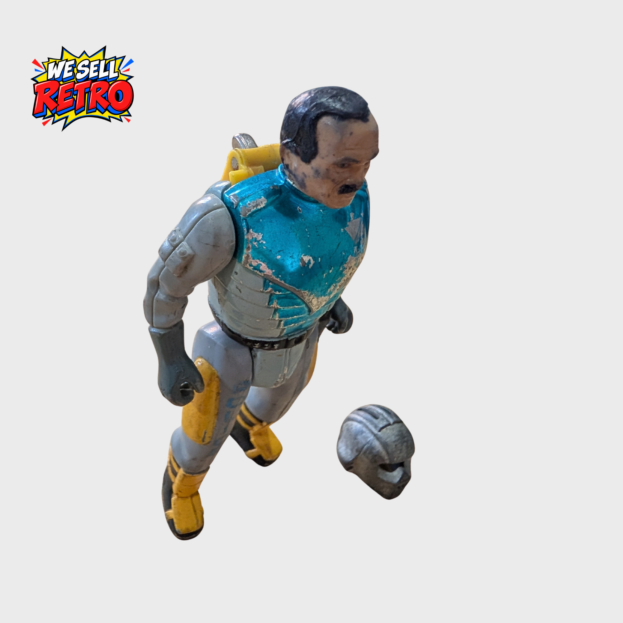 Kenner RoboCop Ultra Police Sergeant Reed Action Figure – With Helmet – Worn Close angled view of Kenner Sergeant Reed figure and removed helmet showing paint loss