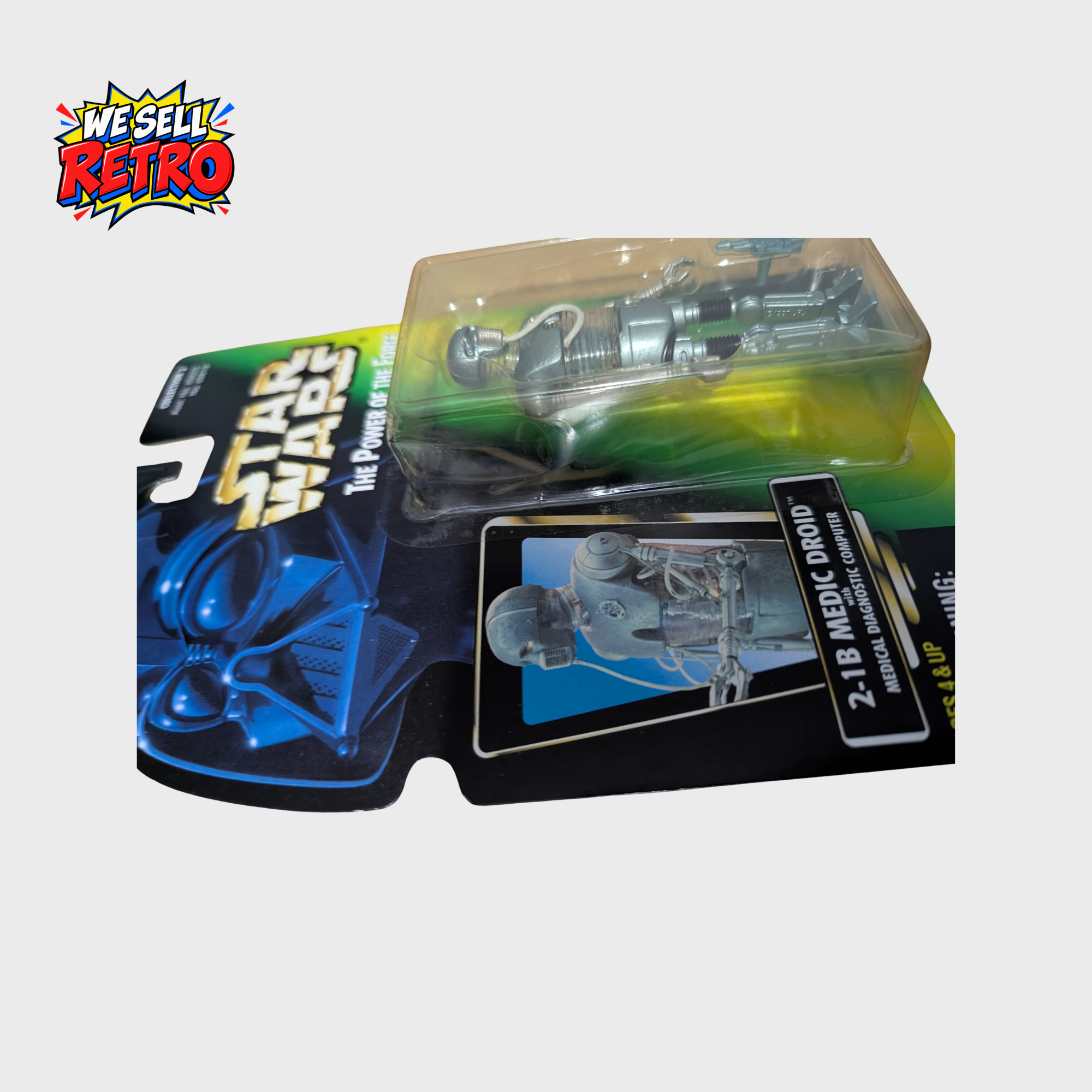 Kenner Star Wars 2-1B Medic Droid – Power of the Force – Carded Kenner Star Wars 2-1B Medic Droid carded figure – side view 1 of actual item