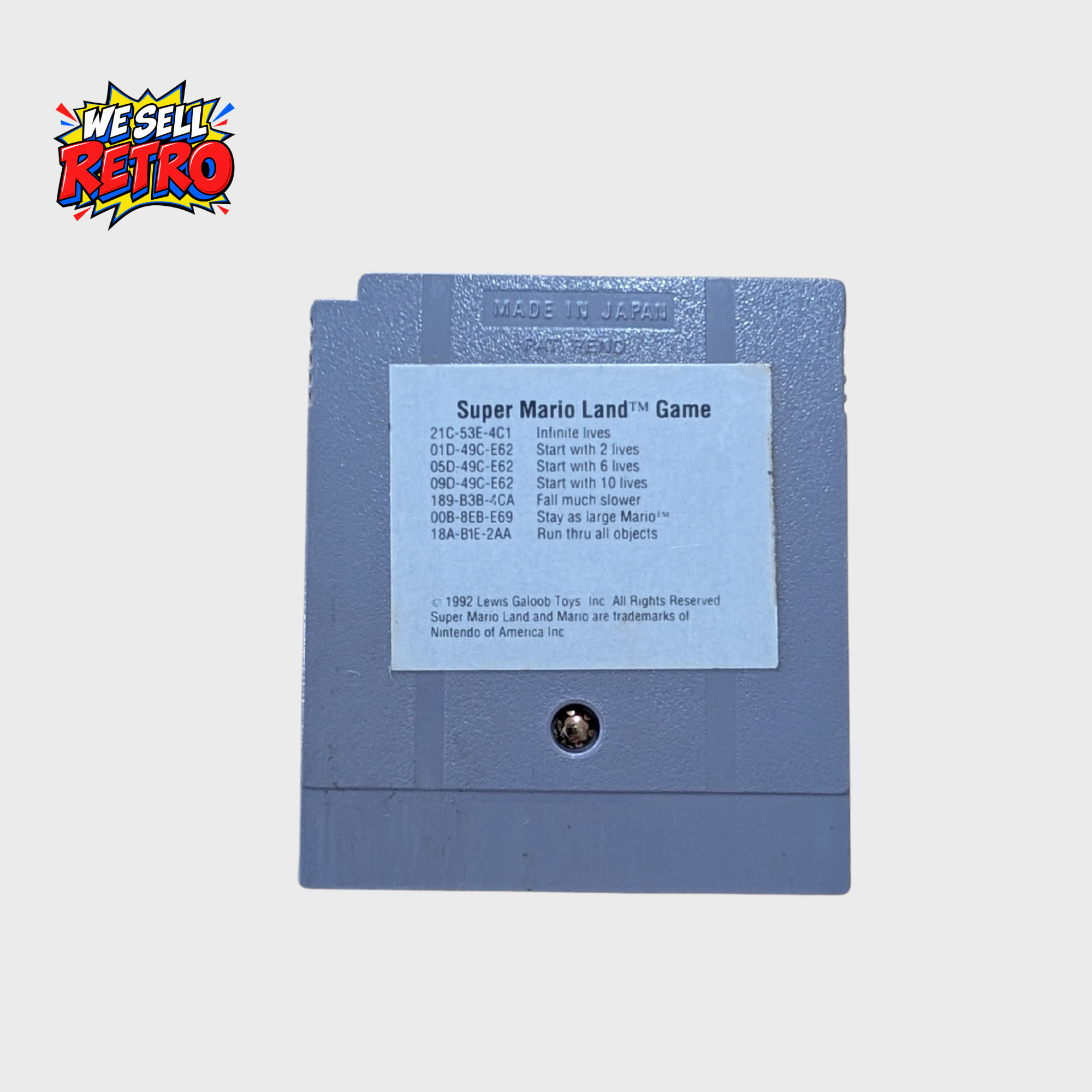 Super Mario Land – Nintendo Game Boy – Cartridge Only – UKV Super Mario Land Game Boy cartridge rear with Galoob Game Genie code sticker