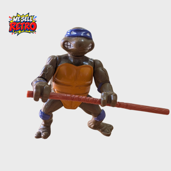 Vintage Playmates TMNT Donatello action figure front view holding his bo staff