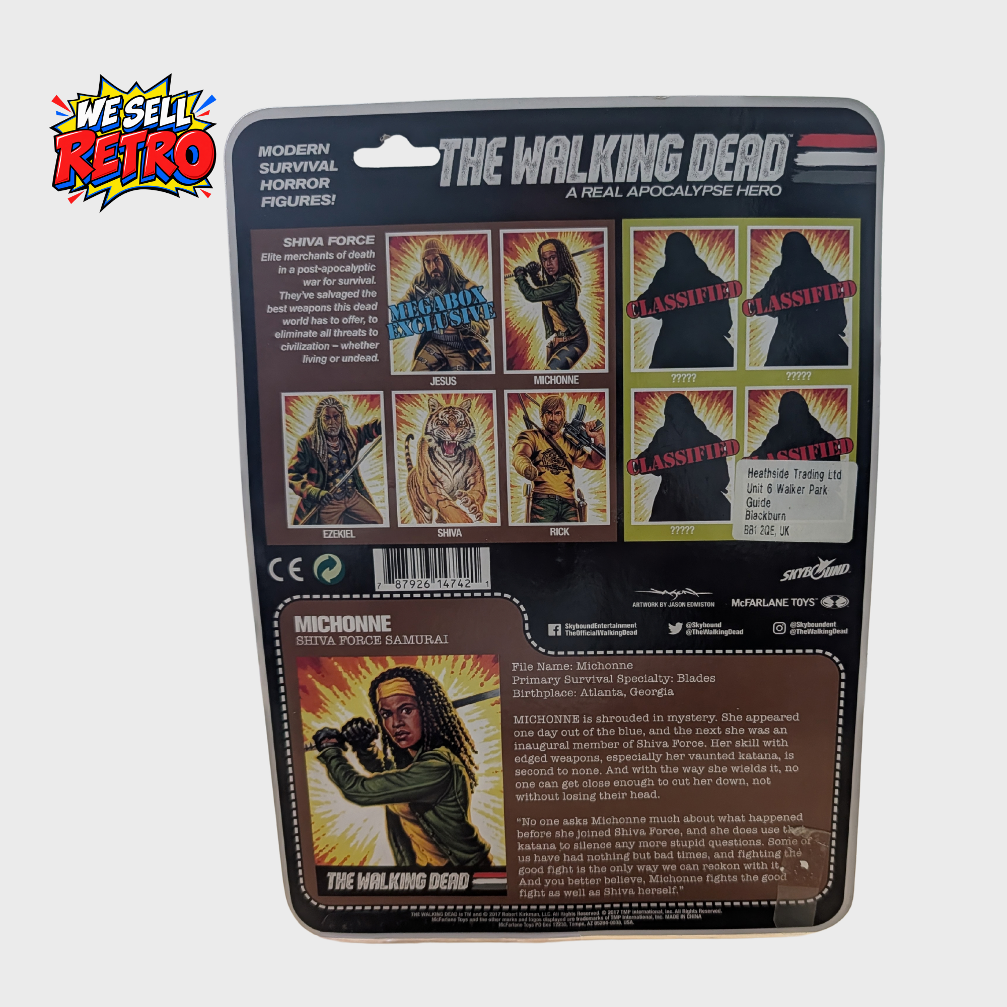 The Walking Dead Michonne Figure – Shiva Force Bloody Variant – McFarlane Carded Figure Back photograph of the actual McFarlane The Walking Dead Michonne Shiva Force bloody variant in its original carded packaging
